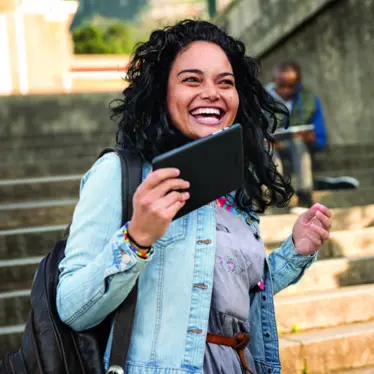 Example image of a girl with a beautiful smile to illustrate title attribute.